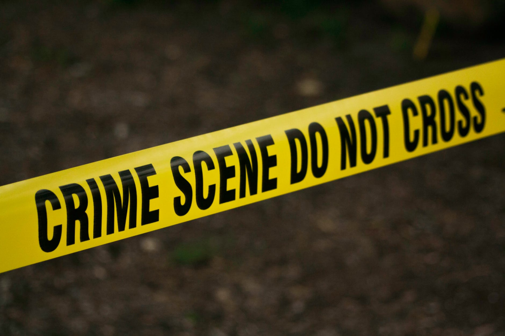 Do-not-cross yellow tape at a crime scene