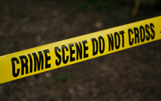 Do-not-cross yellow tape at a crime scene