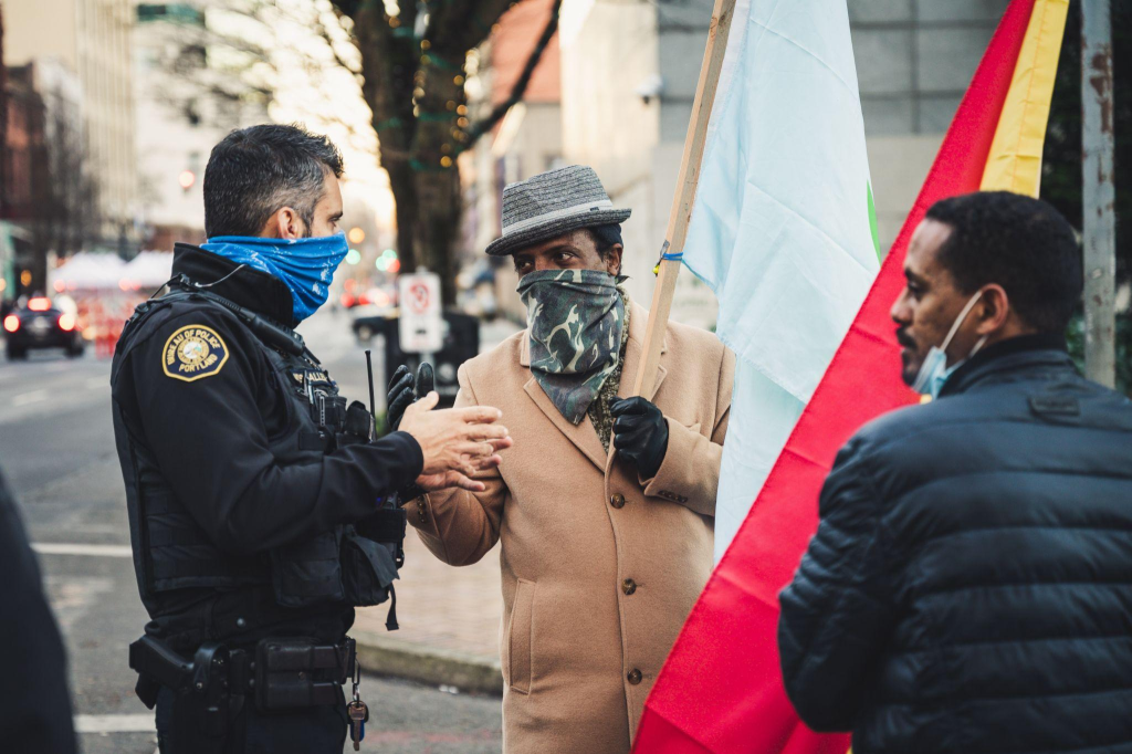 A professional security service provider talking to political members
