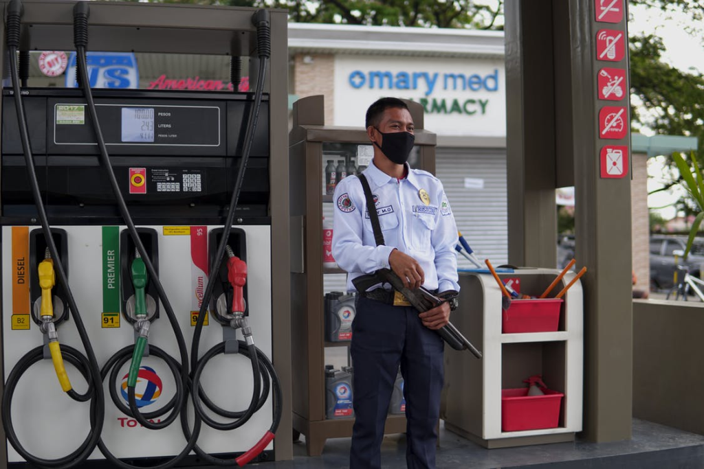 Security guard on duty at a gas station