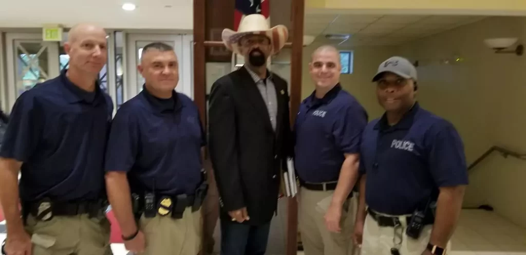 A group of police officers standing next to each other.