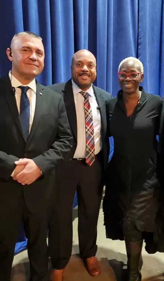 A group of people standing next to each other.