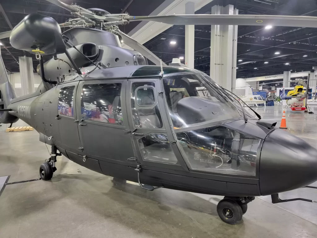 A large airplane is on display in a museum.